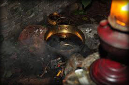 Nam Man Prai is the fat extracted from a person who was killed in violent or sudden circumstances. This is often used to mix into the Gumarn Tong amulets, as well as other love charms and attraction spells. Sacred oil is given extra magical charging by adding various magical objects and substances to soak in the oil.