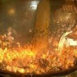 Nam Man Suea Prai Oil Being Made in Cauldron using Herbal Method, for the later immersion of Guru Monk Coins in a later empowerment ceremony